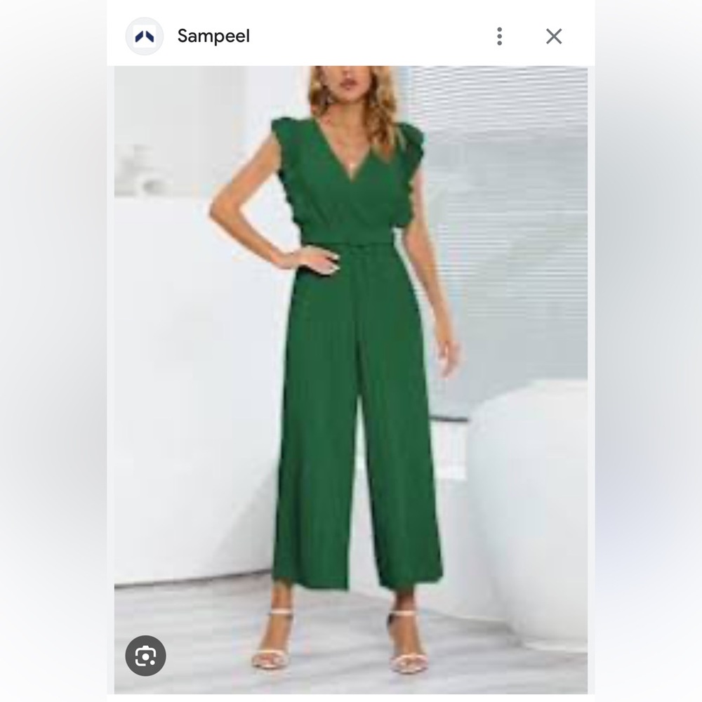 Emerald Green Jumpsuit with flowy pleated legs.